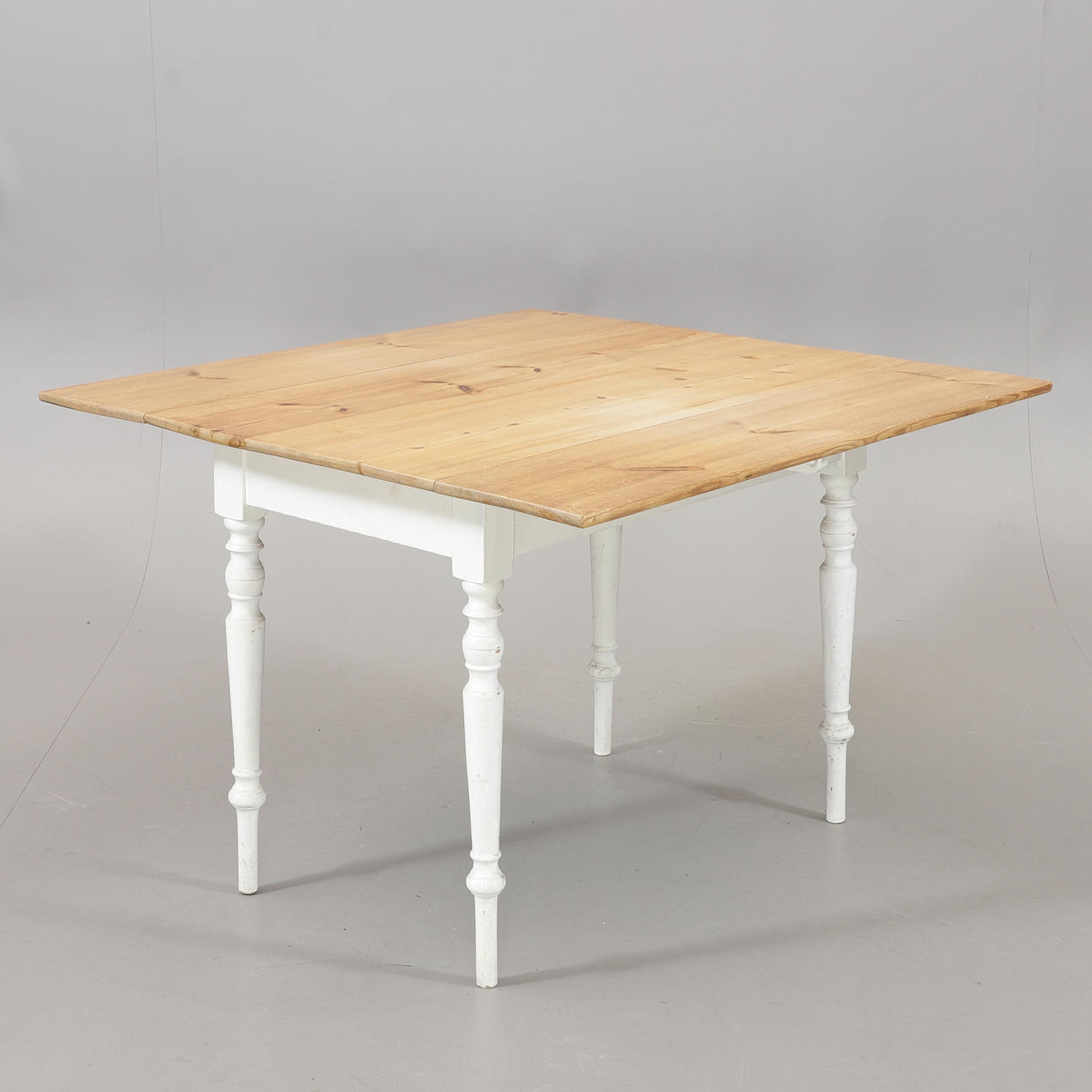 A folding table, early 20th century.