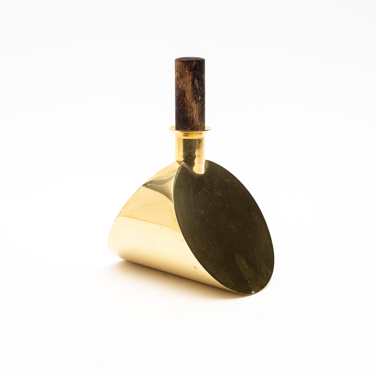 PIERRE FORSSELL. Brännvinsflask, with stopper of stained wood, brass, no.:1607, Skultuna.