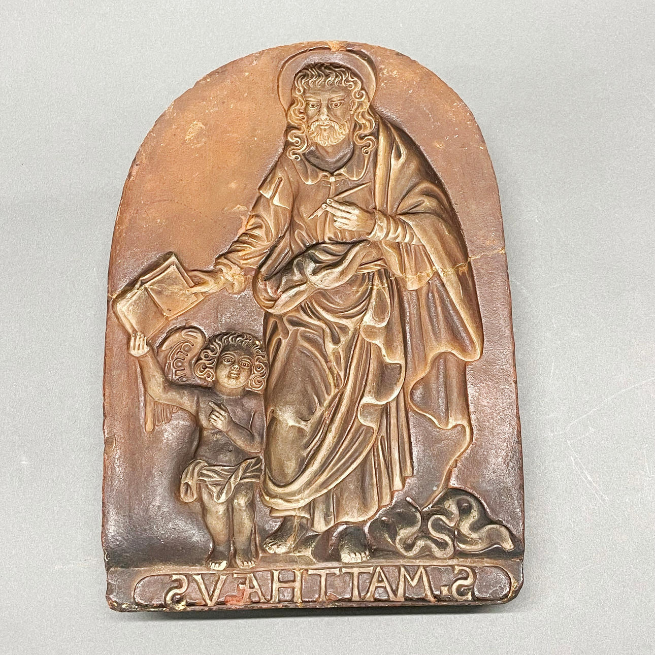 18THC TERRACOTTA SAINT MATTHEW MOULD.