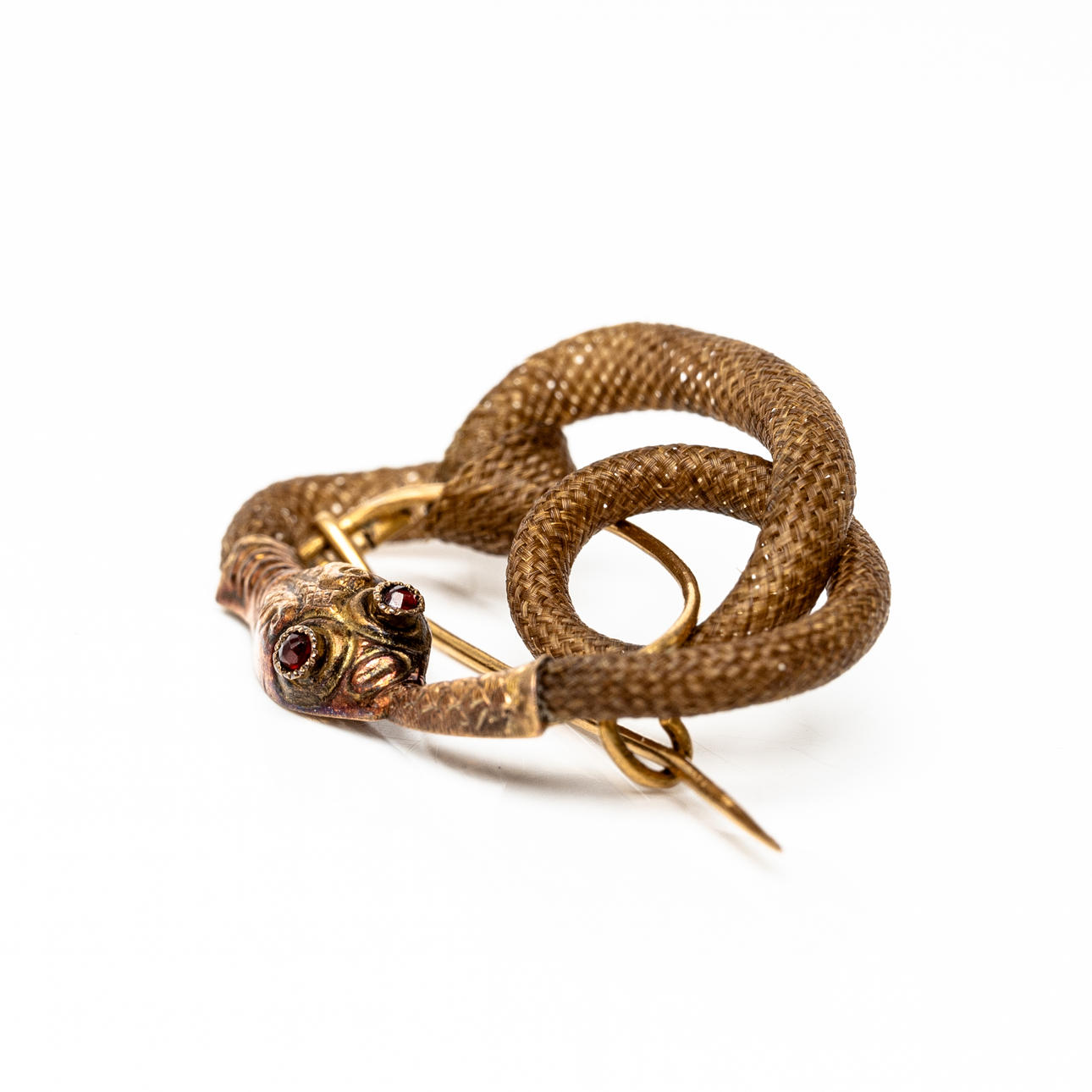 A 18K gold brooch in the shape of a snake, Gothenburg, probably the end of the 19th century.