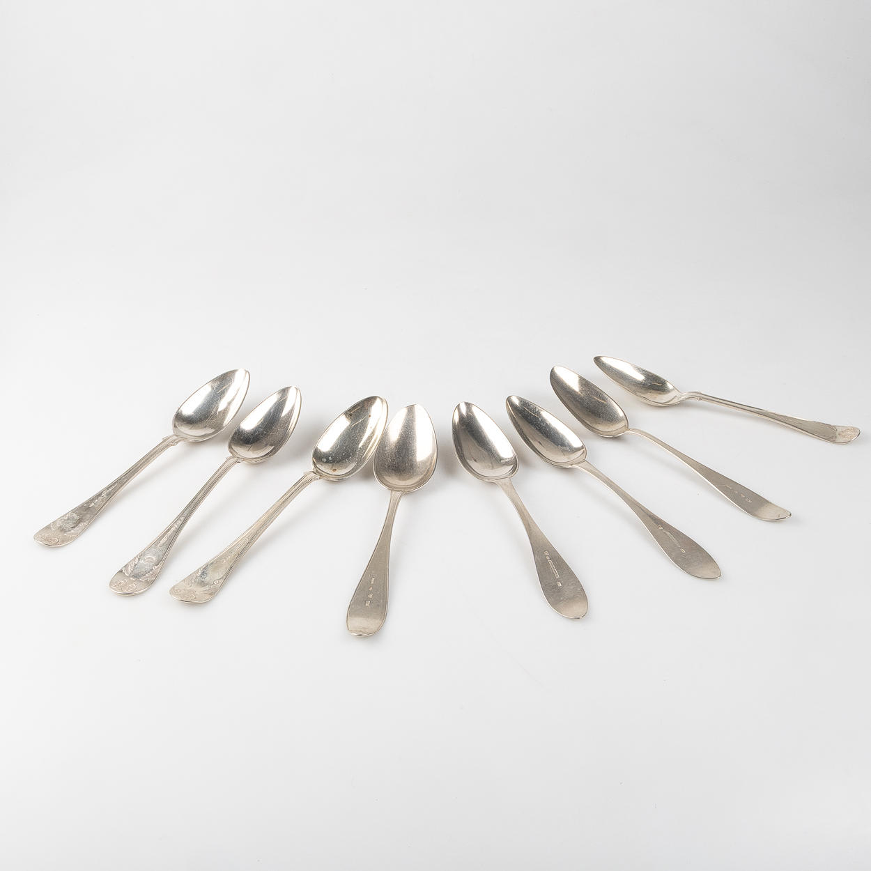 A set of 8 silver spoons, 19th century, including A Wanström.