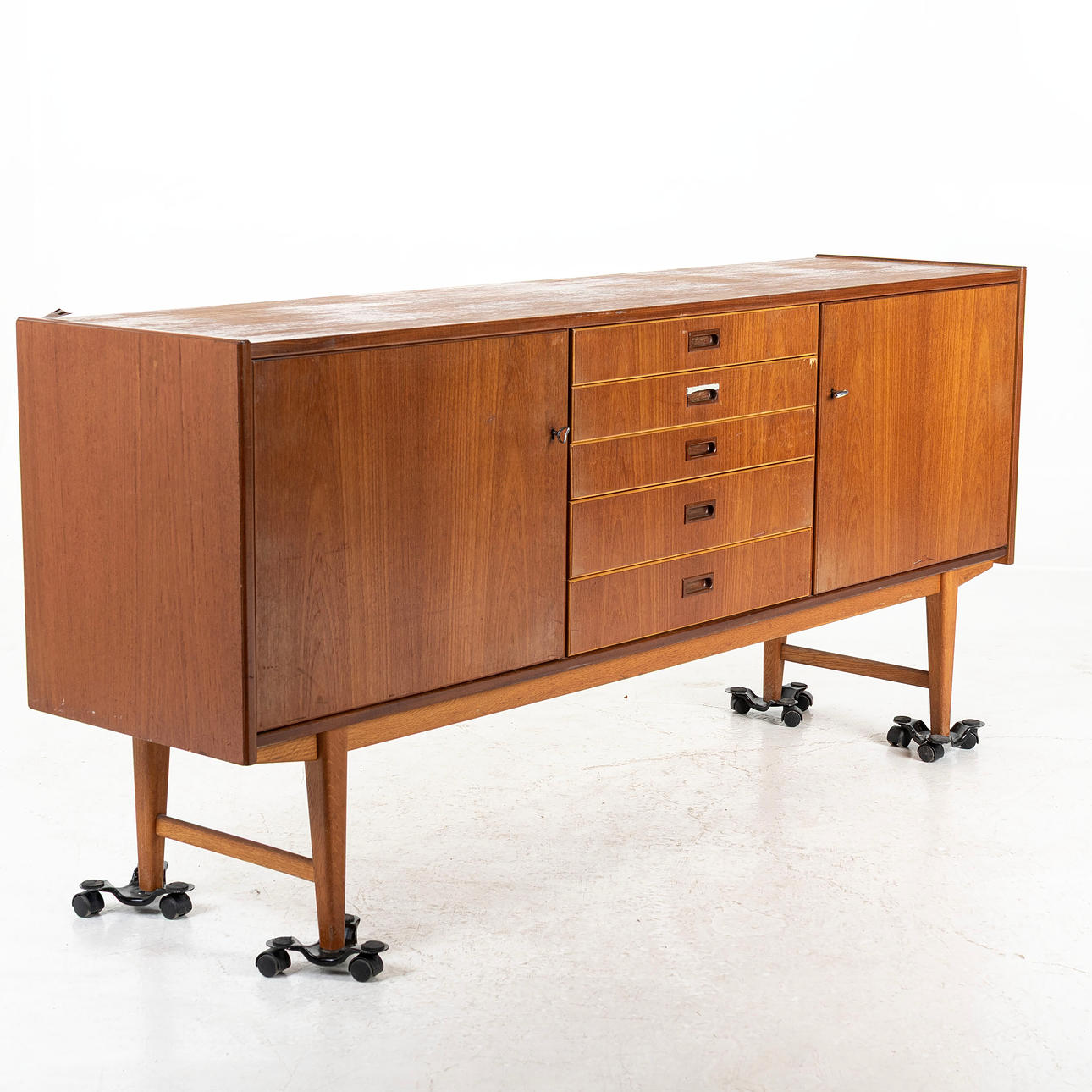 A sideboard, teak, 1950s/60s.