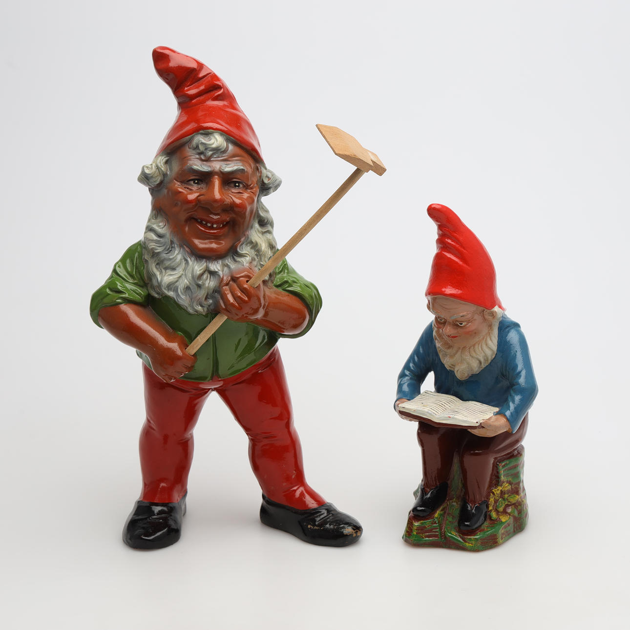 A set of two ceramic gnomes.