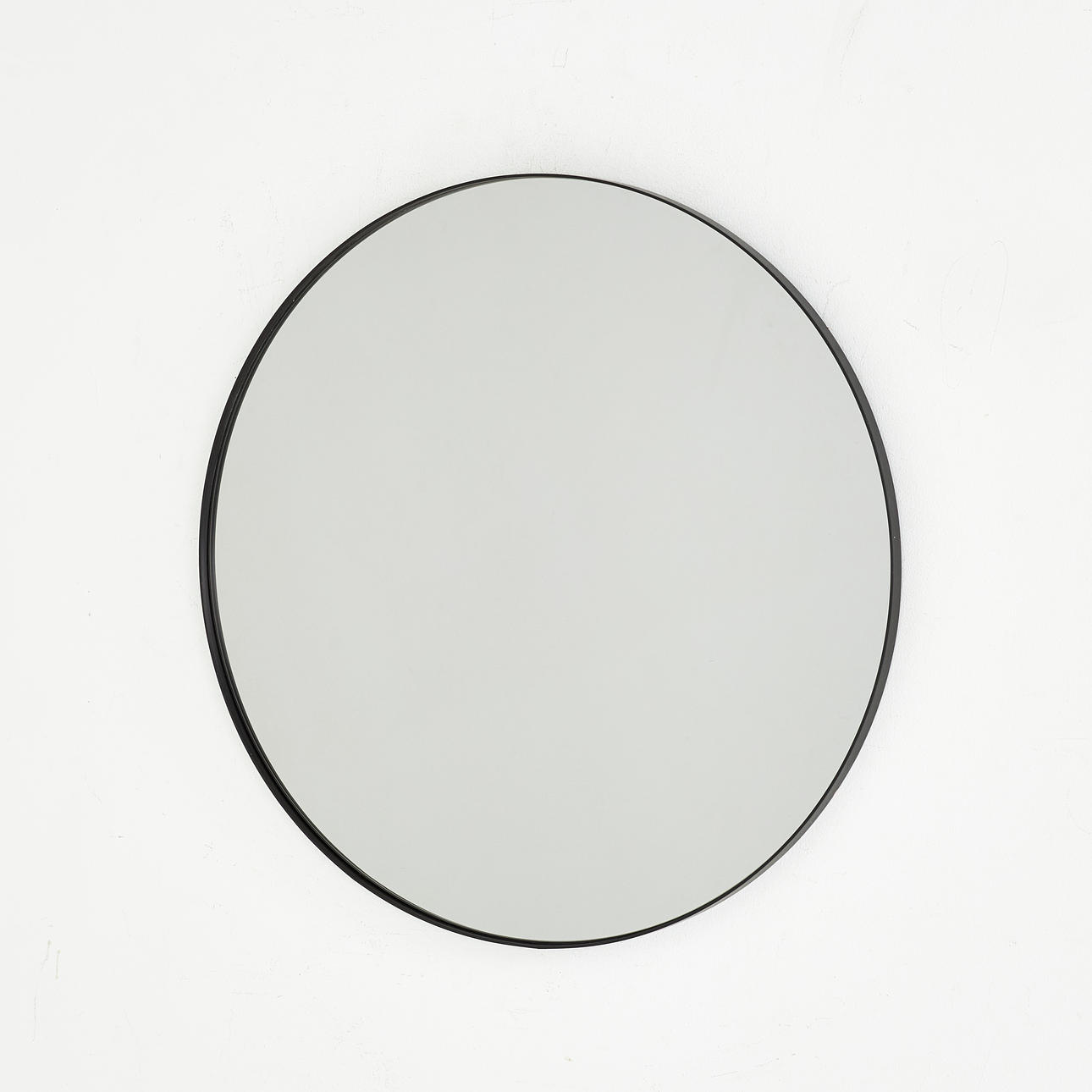 Mirror, 21st century, round model, black lacquered frame.