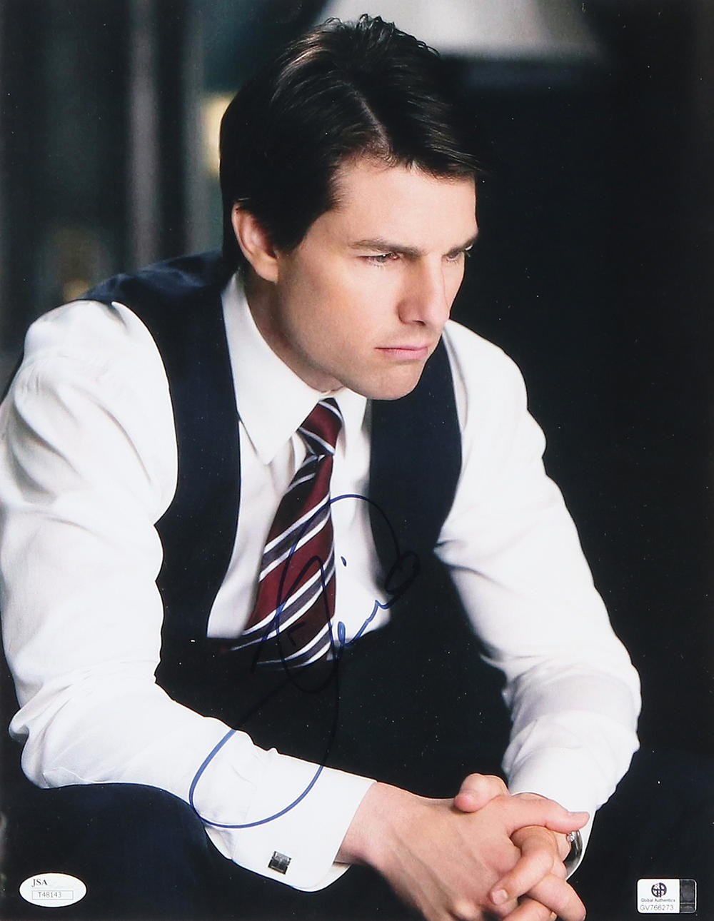 TOM CRUISE, SIGNED PHOTOGRAPH. On verso with accompanying certificates.