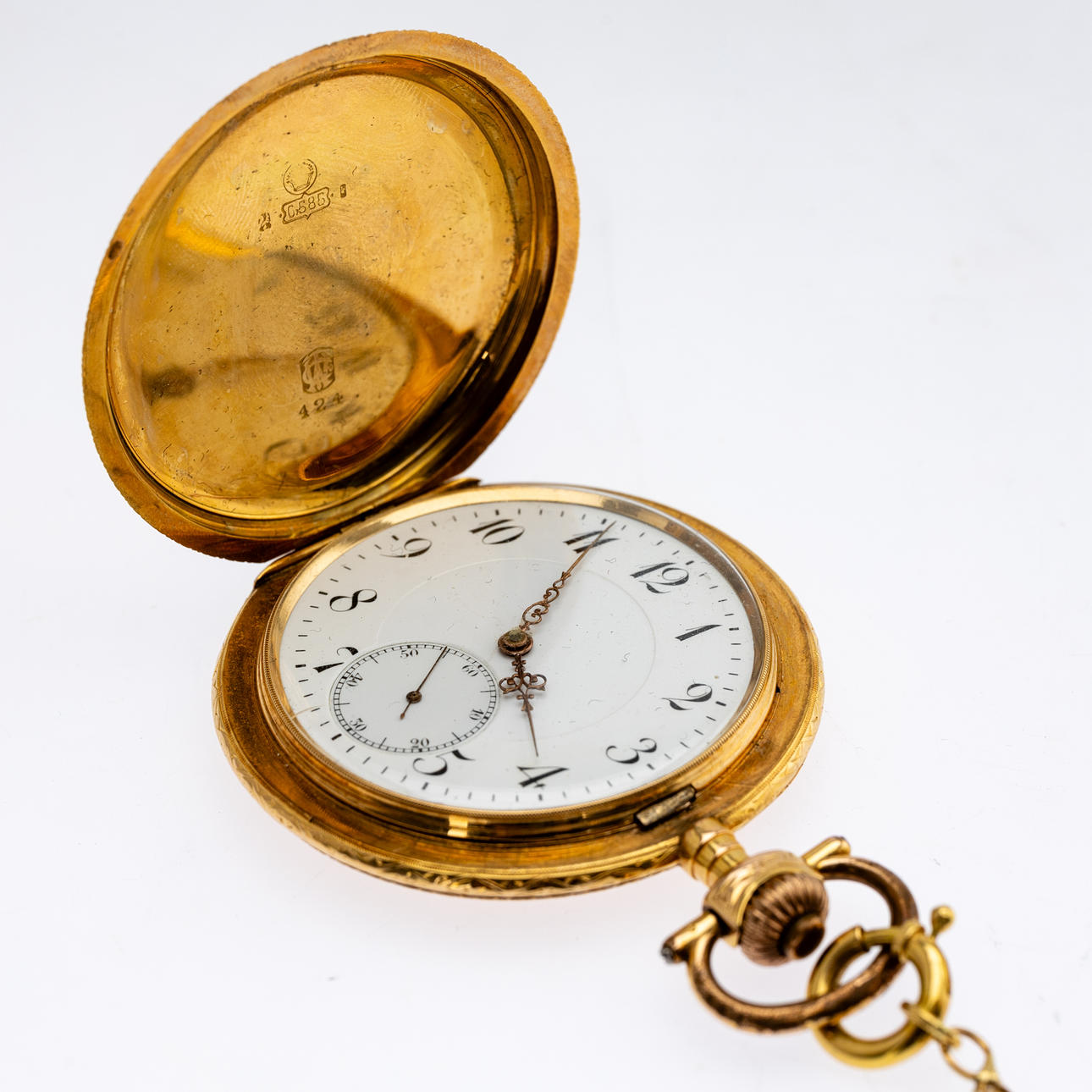 585 kultainen taskukello ketjulla.