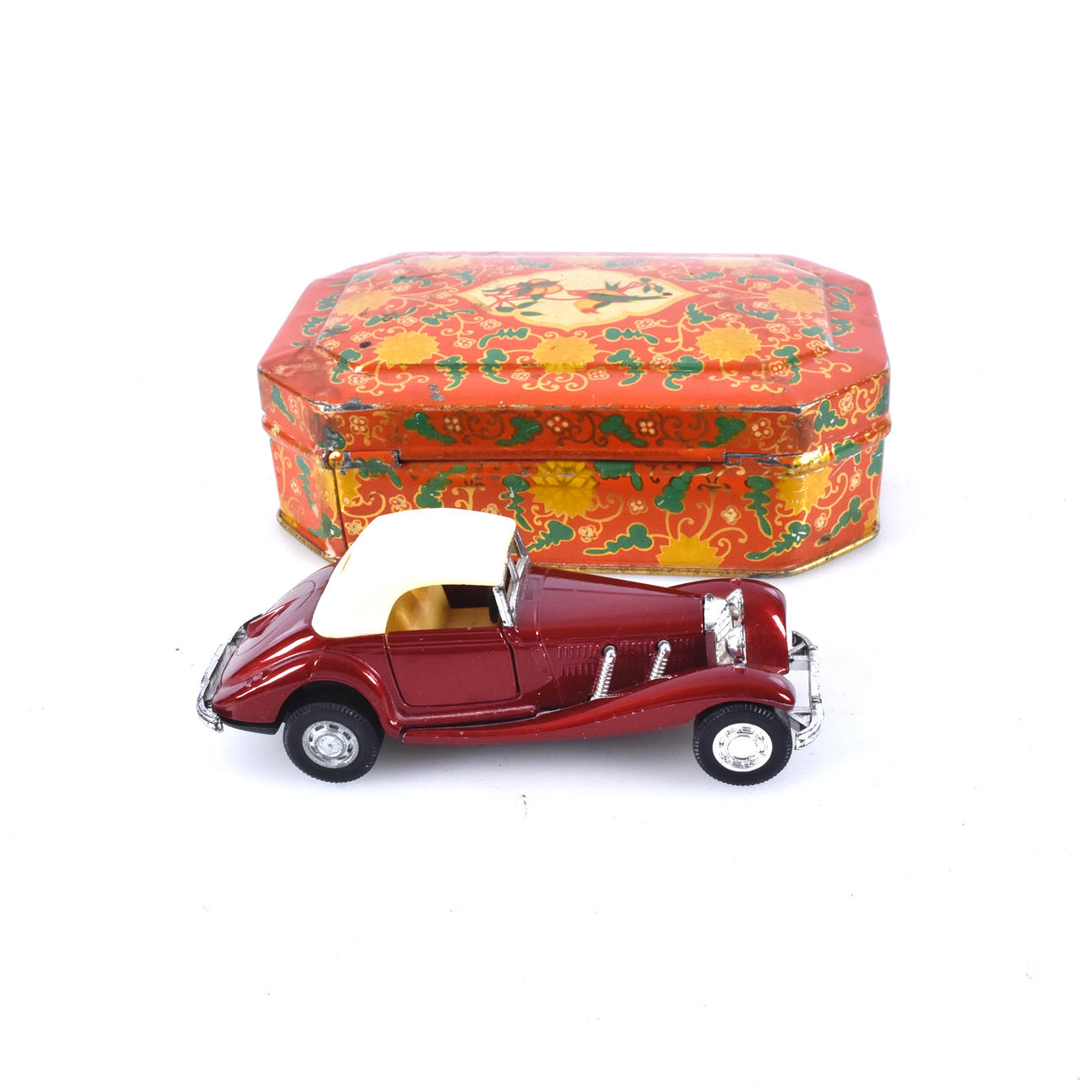 MODEL CAR AND TIN CAN, 20th century.