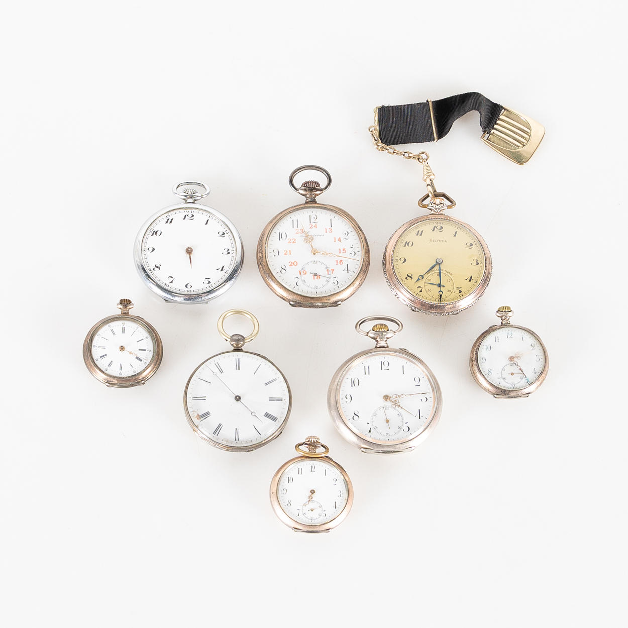 8 relojes de bolsillo, plata y níquel.