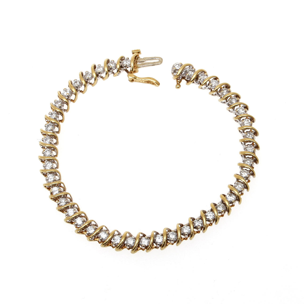 ARMBAND, 18k guld med diamanter, totalt ca 2,0 ct. Vikt 16,5 gram.