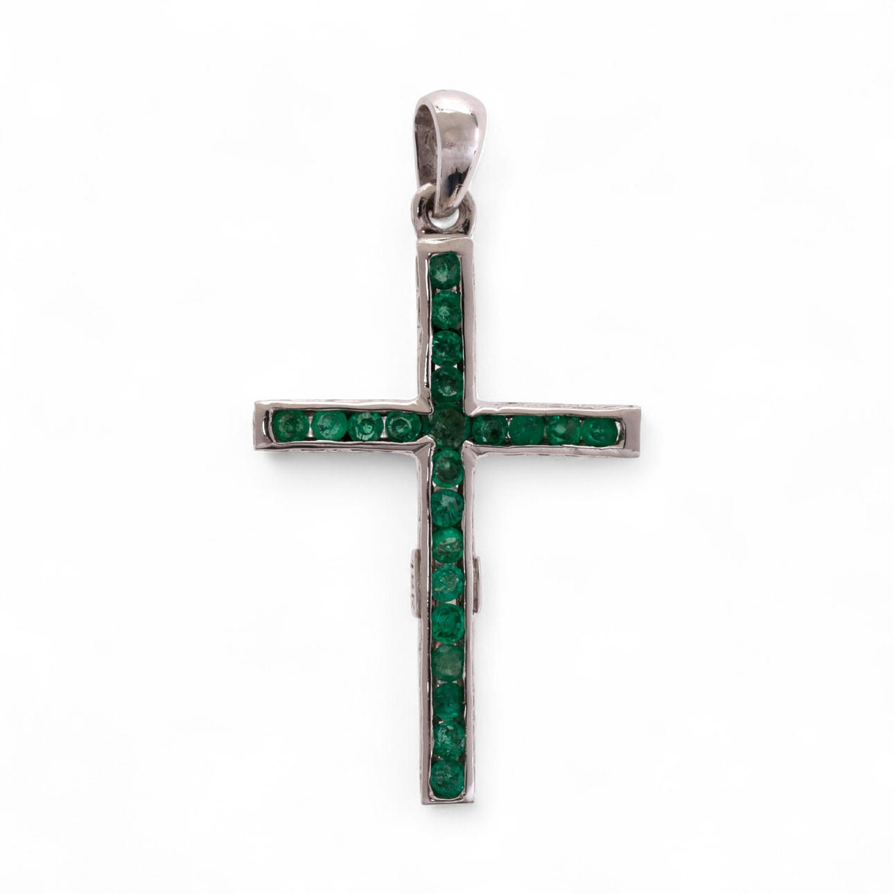 Diamonds and emeralds pendant cross.