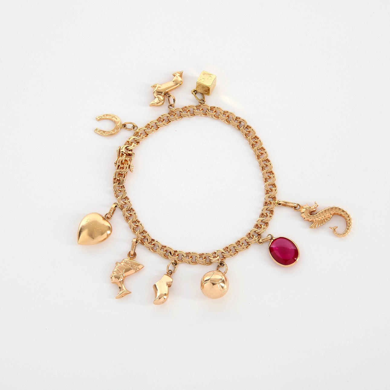 BISMARC BRACELET WITH CHARMS, 18K gold, 1957.