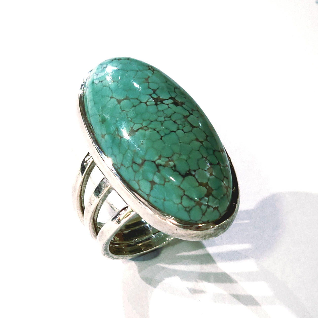 Large cabochon turquoise ring. Silver frame. No. 15 Brand new.