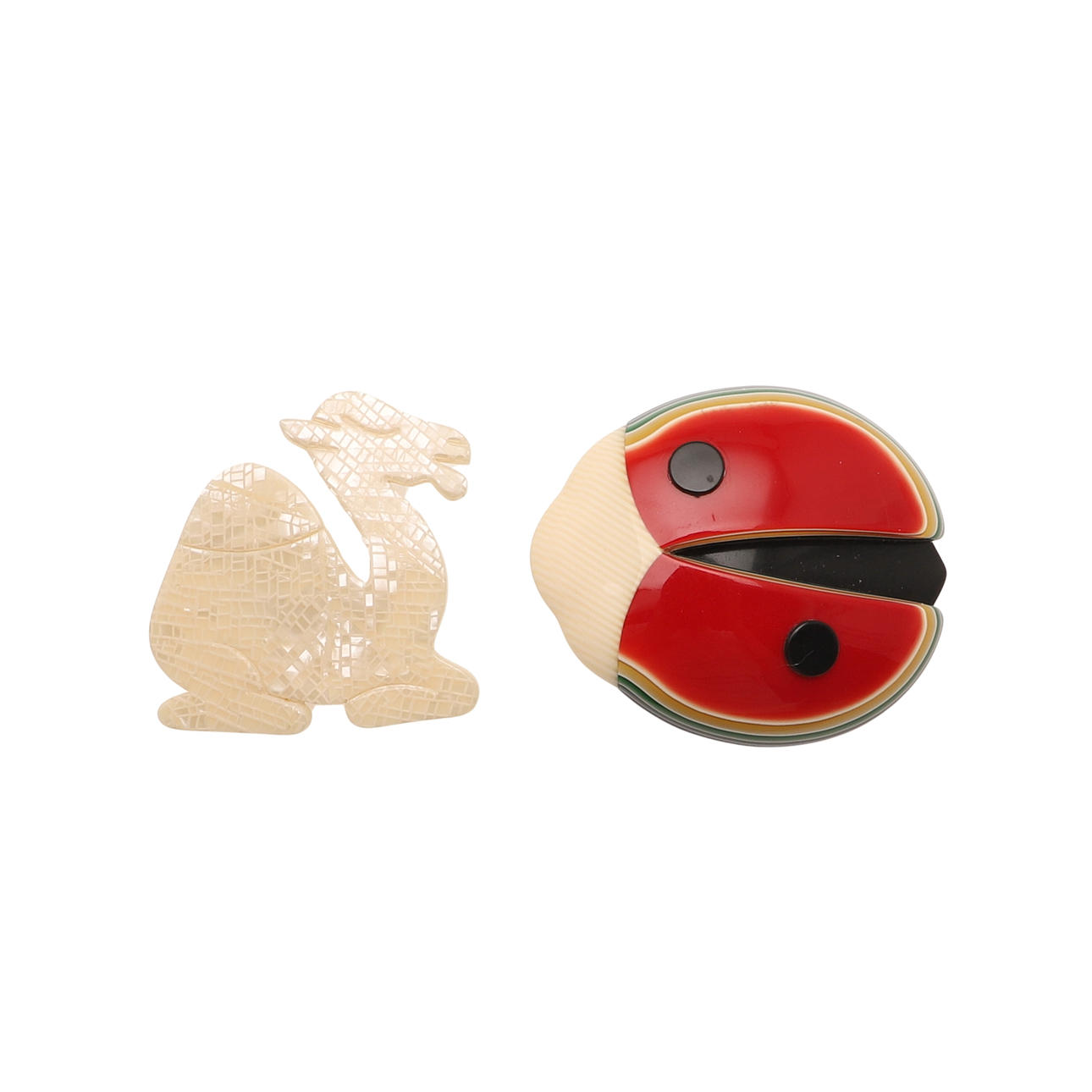 TWO LEA STEIN BROOCHES, LADYBIRD AND CAMEL.