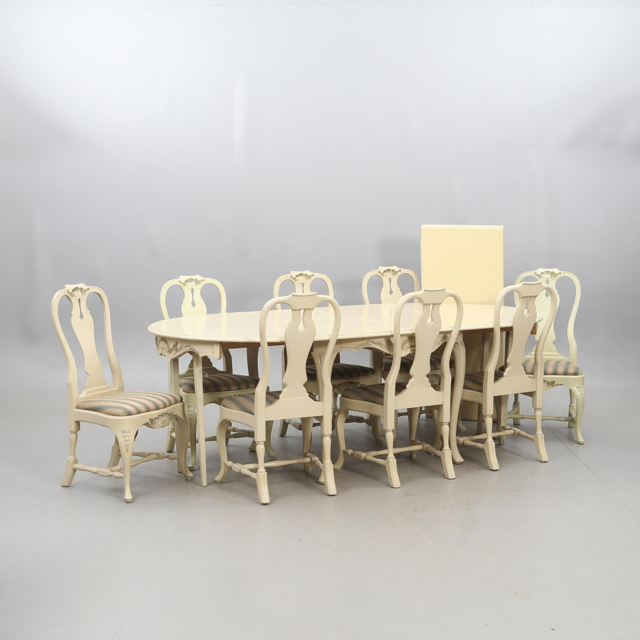 A rococo style 13-piece dining group, 20th century.