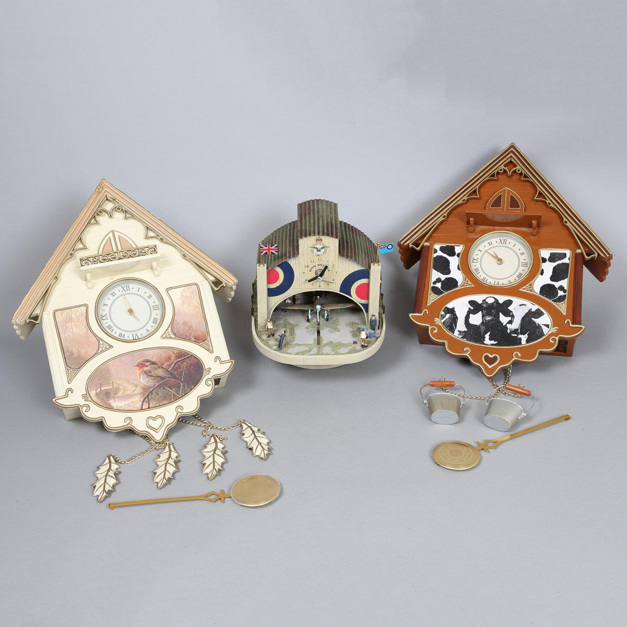 THREE BRADFORD EDITIONS NOVELTY WALL CLOCKS (3).