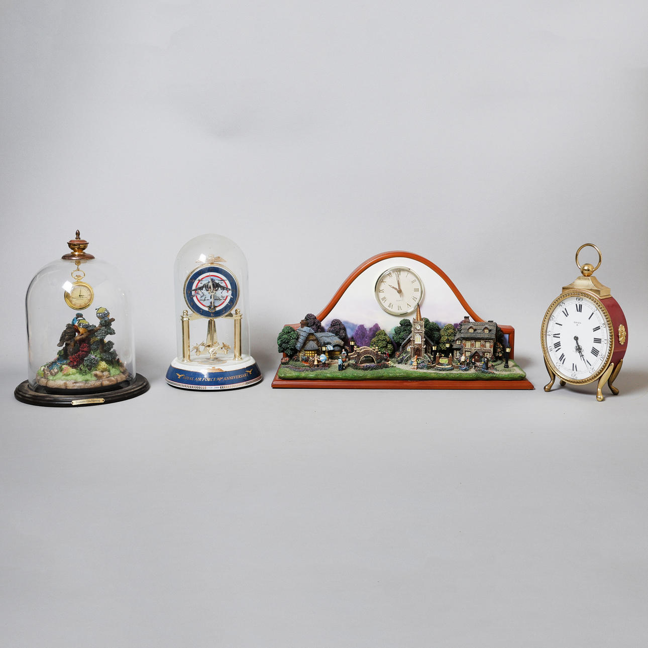 TWO BRADFORD EDITION CERAMIC CLOCKS AND TWO OTHER CLOCKS (4).