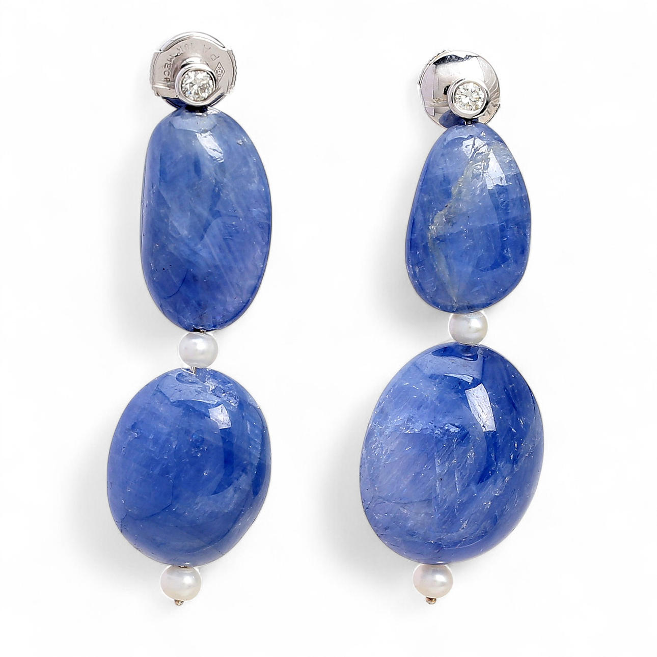 Lange safir og diamant øreringe.