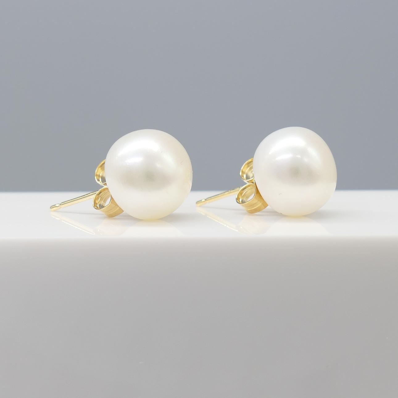 ZUCHTPERLENOHRSTECKER, Gelbgold.