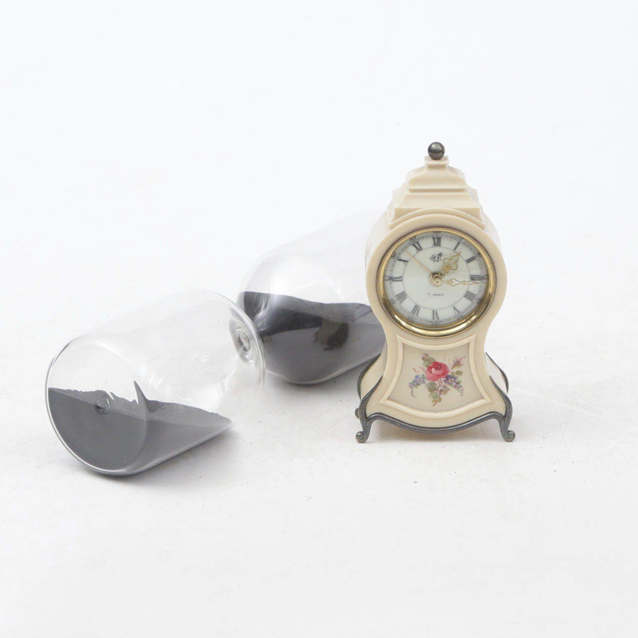 TABLE CLOCK, plastic, HOURGLASS, glass.