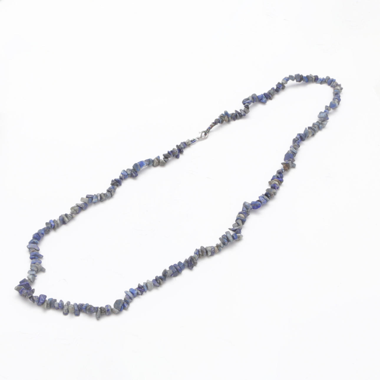 A necklace, stone, lapis lazuli.