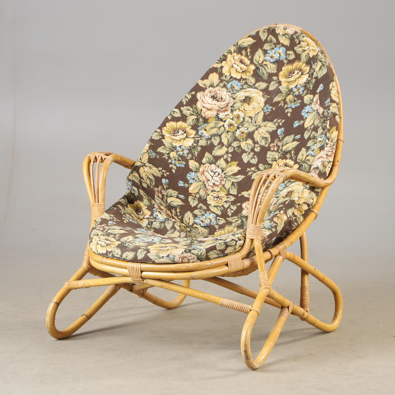 A rattan armchair, 1970s.