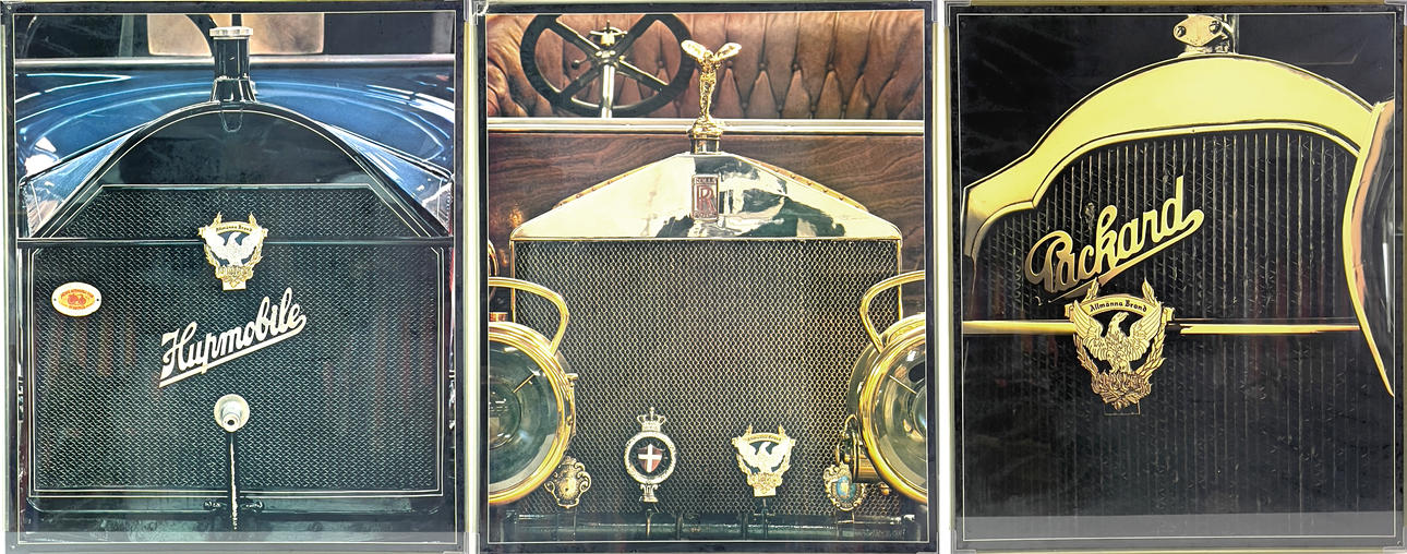 Three posters, Rolls-Royce, Hupmobile and Packard.