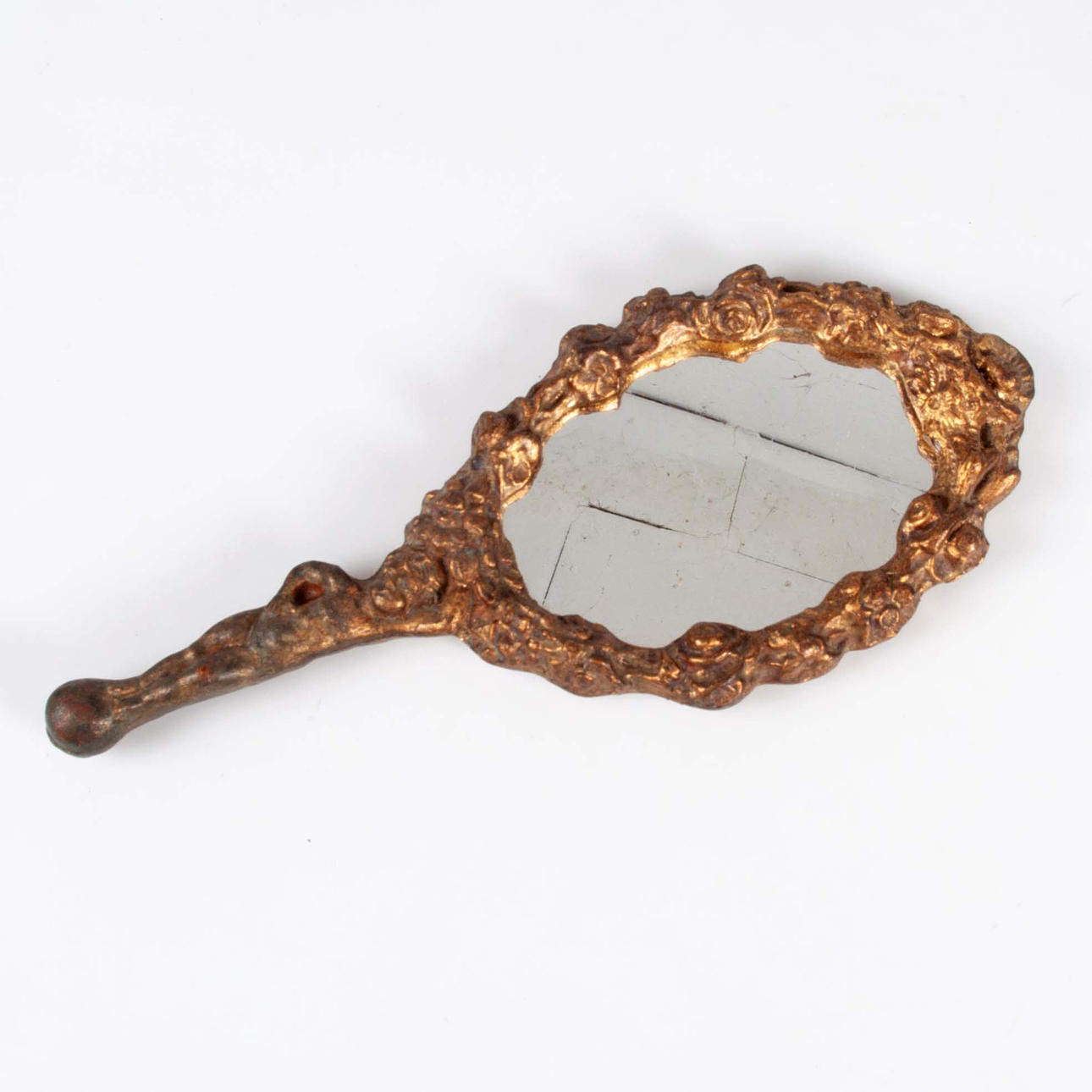A Baroque hand mirror, mid 20th century.