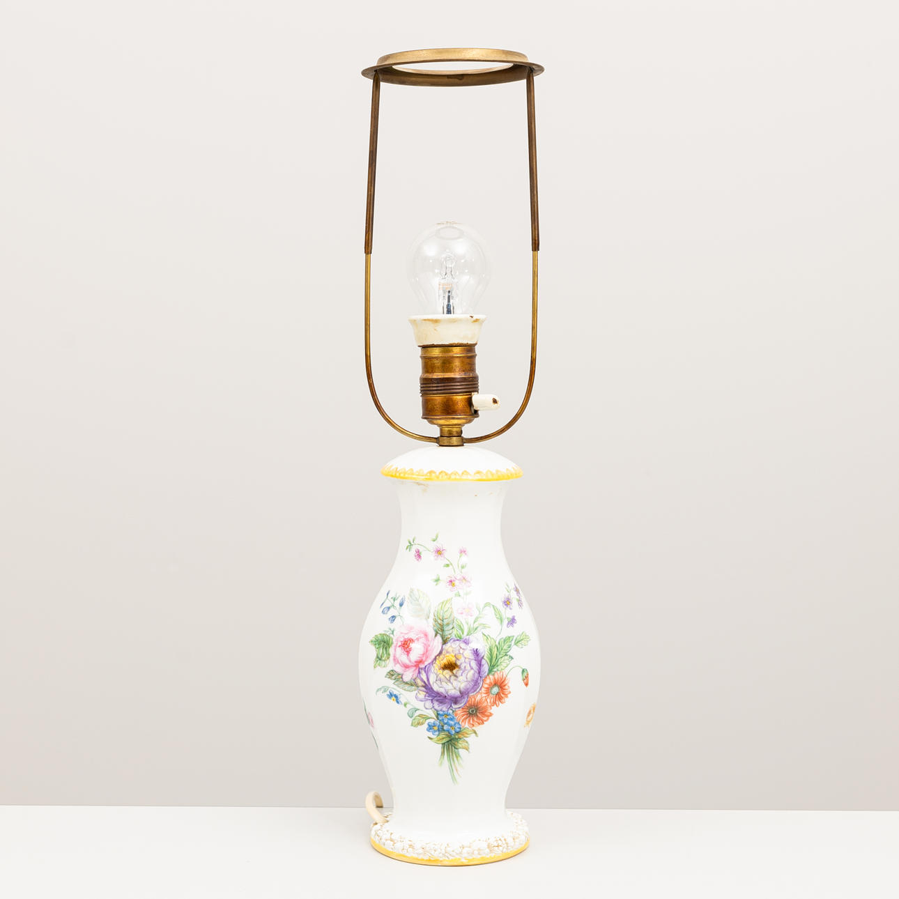 A Rosenthal porcelain table lamp dated 1923.