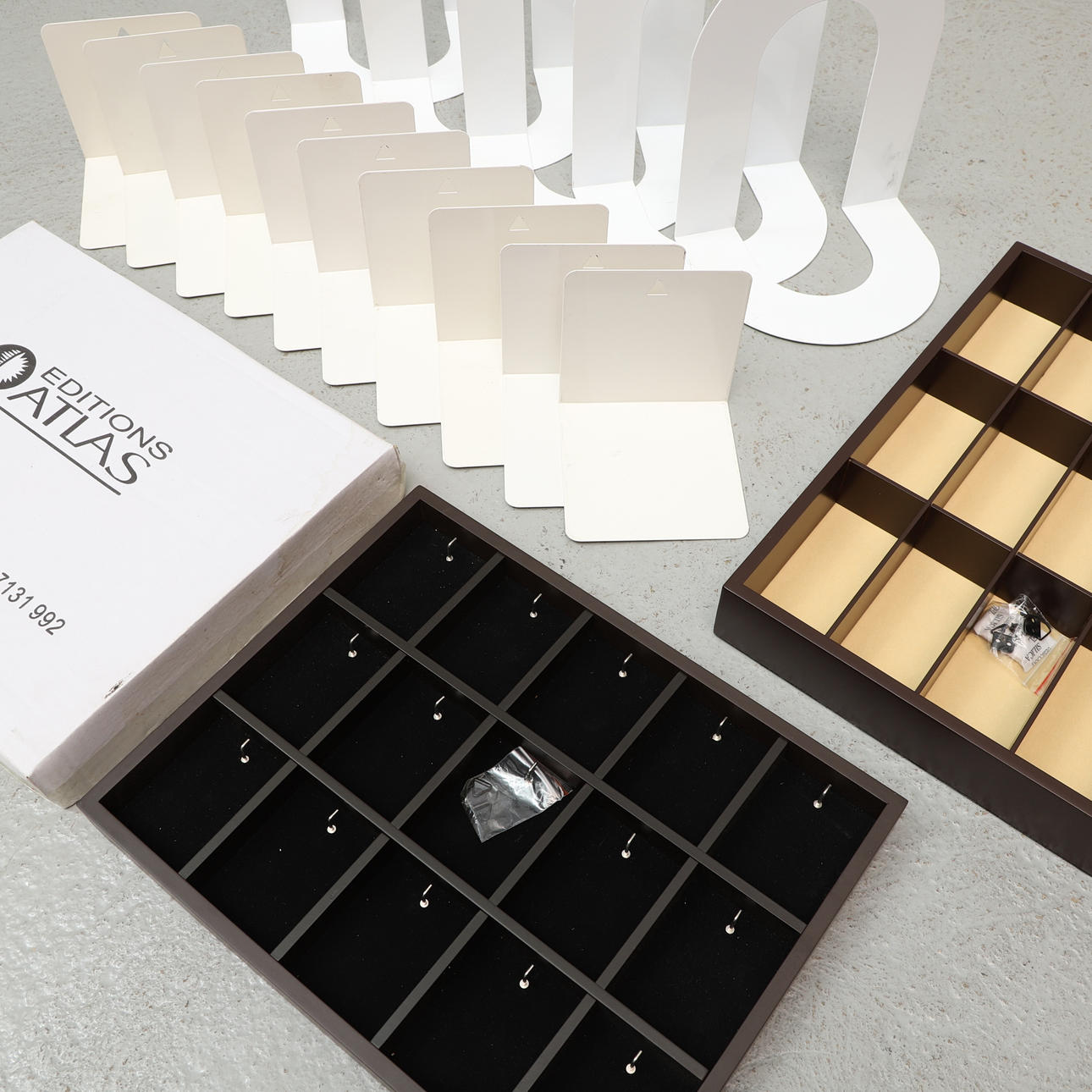 DISPLAY SHELVES & WALL BRACKETS, 18 pcs, inter alia Atlas Editions.