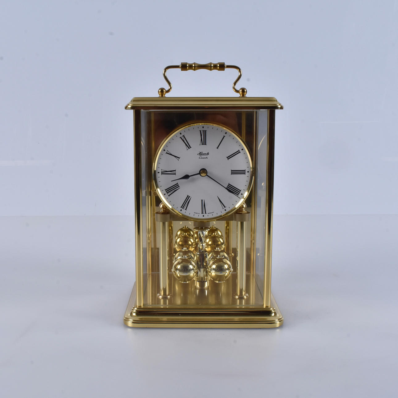 A 20th century brass table clock.