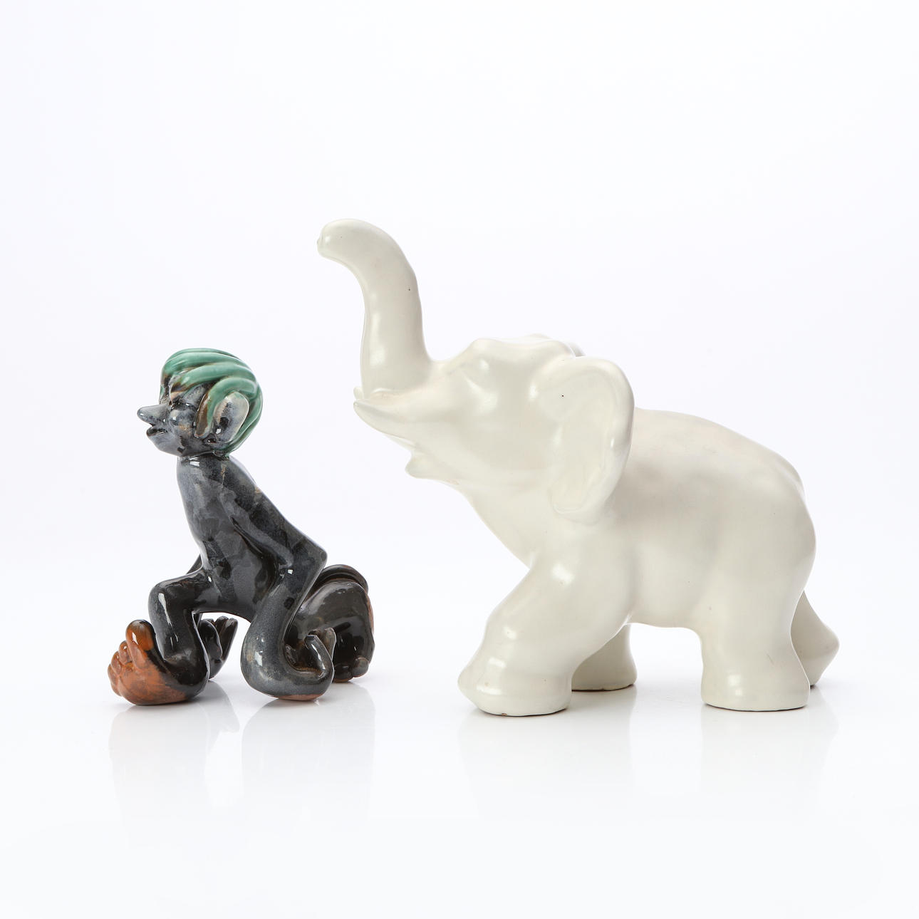 VICKE LINDSTRAND. FIGURINES, TWO PCS. Glazed earthenware. Elephant and troll.