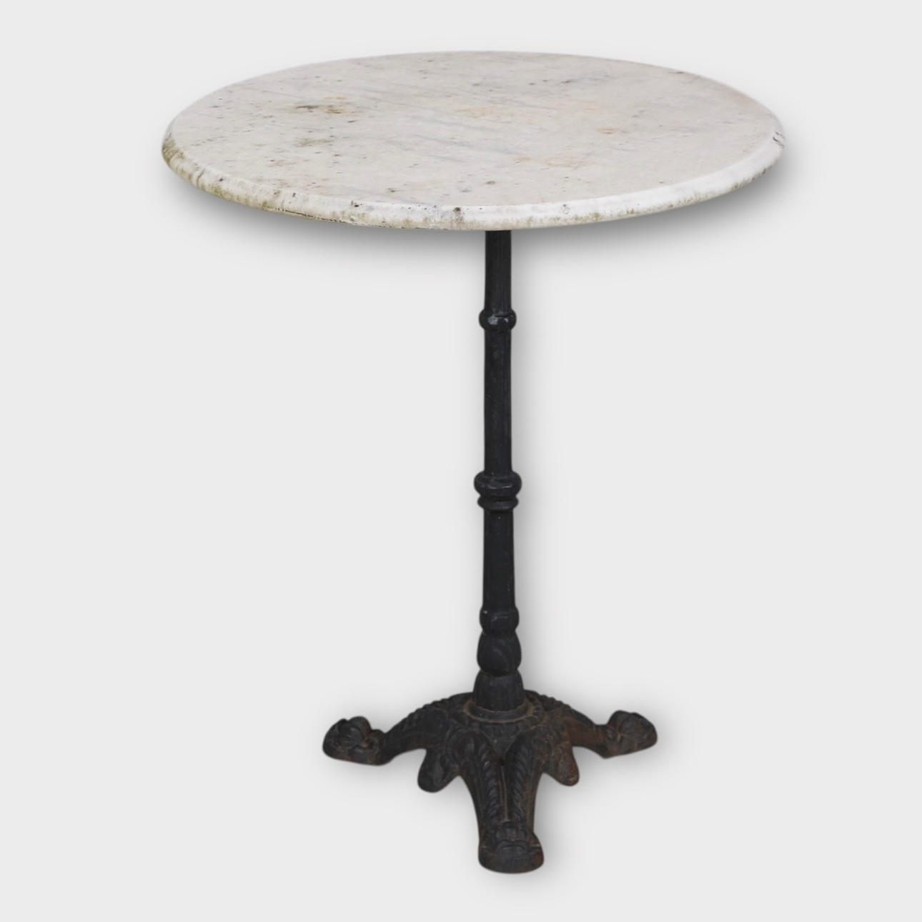 PILLAR TABLE, pillar stand on three legs in cast iron with white marble table top.