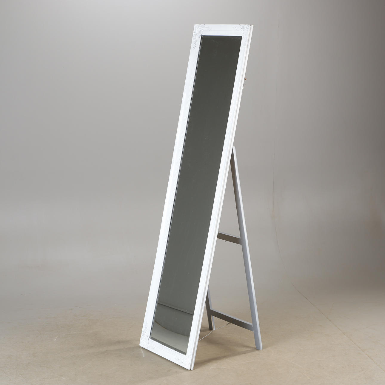 A 21st-century white painted floor mirror.
