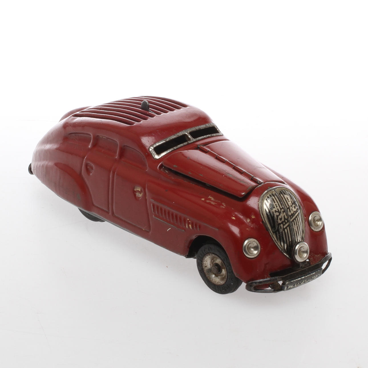 SCHUCO KOMMANDO ANNO 2000 vinröd DRGM made in Germany 1930-tal. urverk.