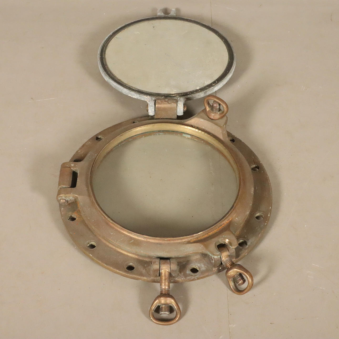 BOAT WINDOW brass with metal door.