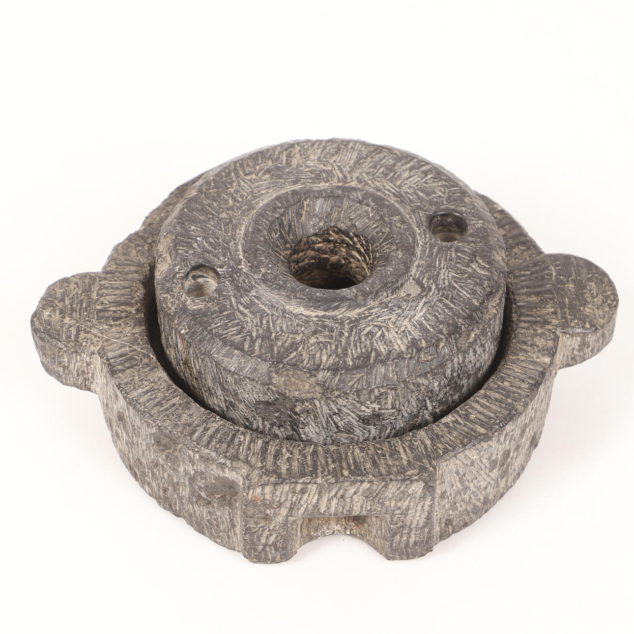A stone hand mill, 1700/19th century.
