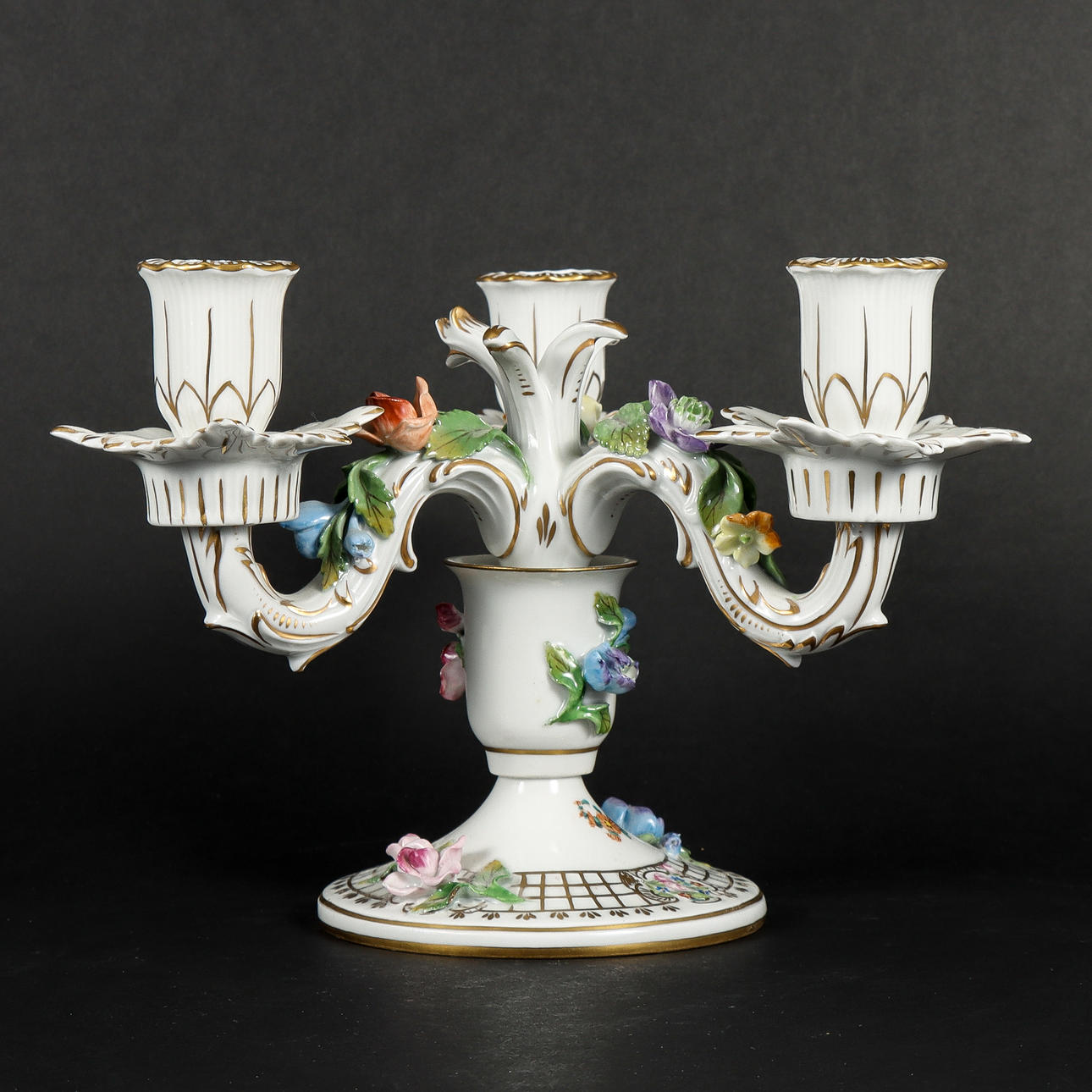 A three-armed porcelain candelabra, Dresden.