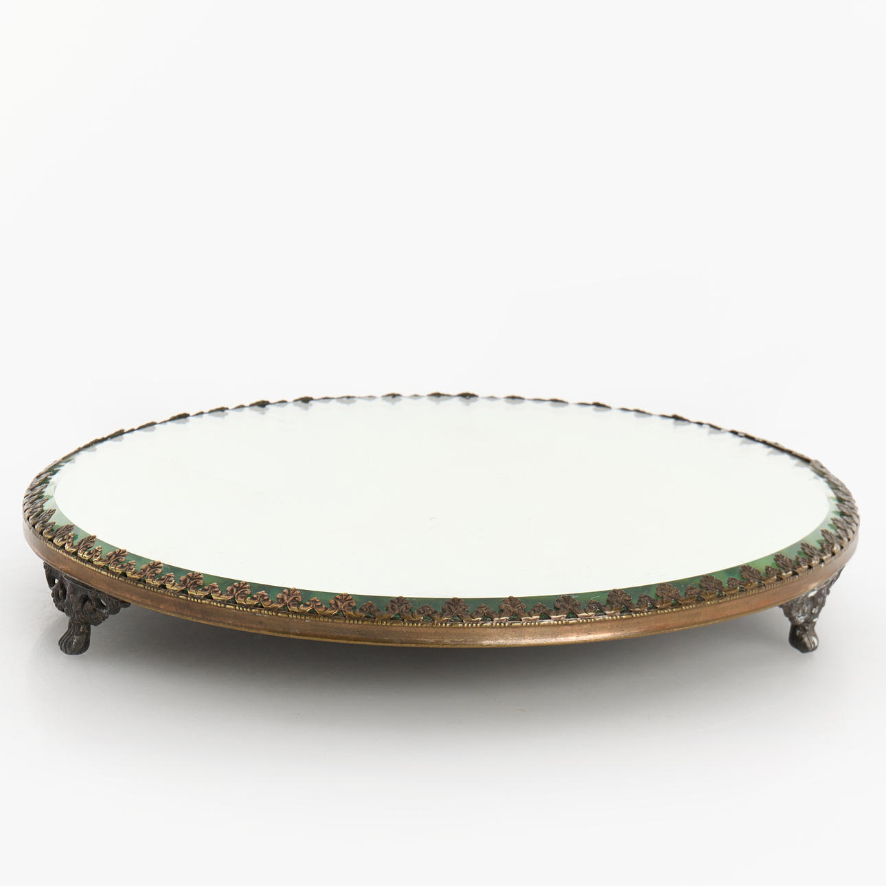 A mirror plateau, on three paws, openwork border decor, first half of the 20th century.