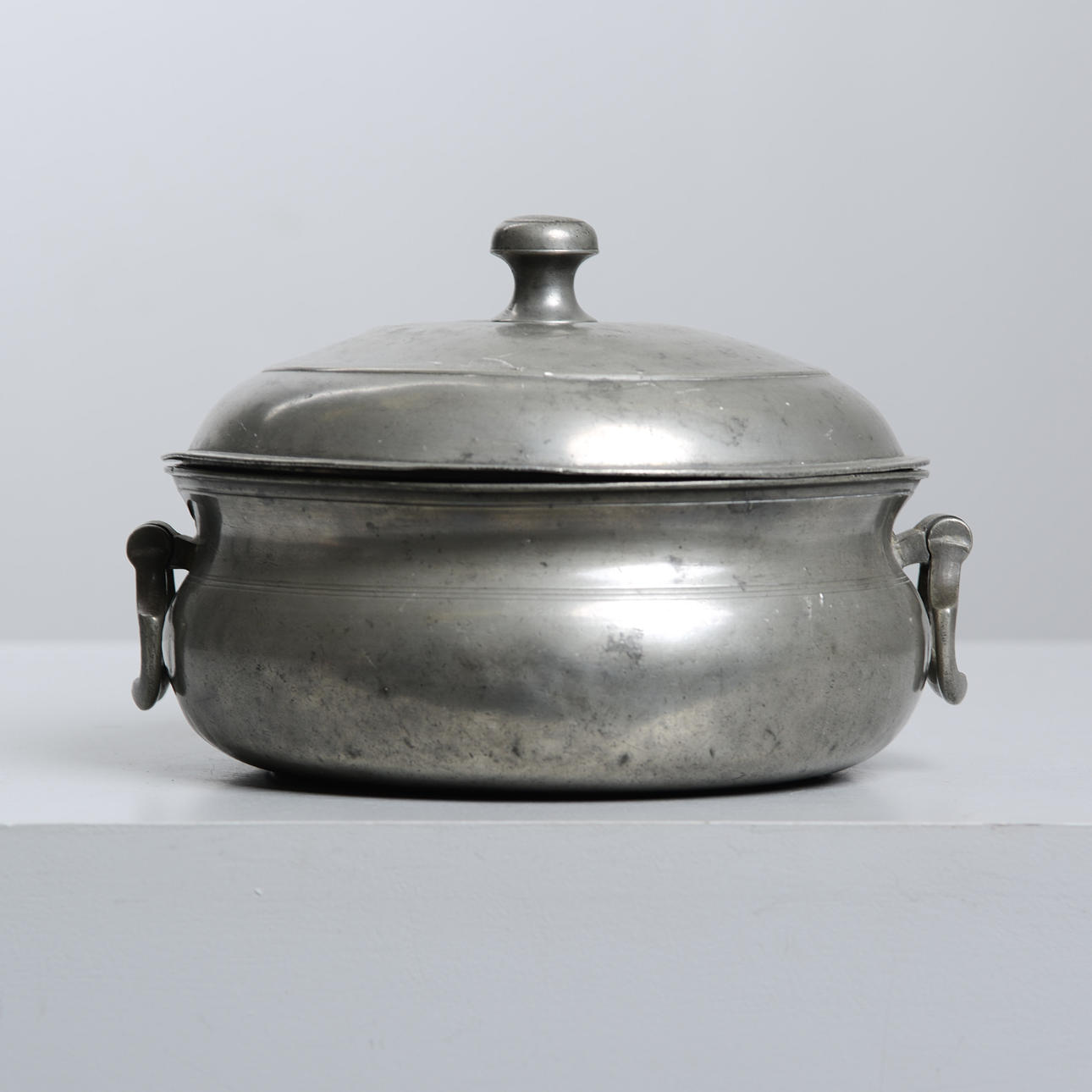 A tin casserole dish, probably 19th century.
