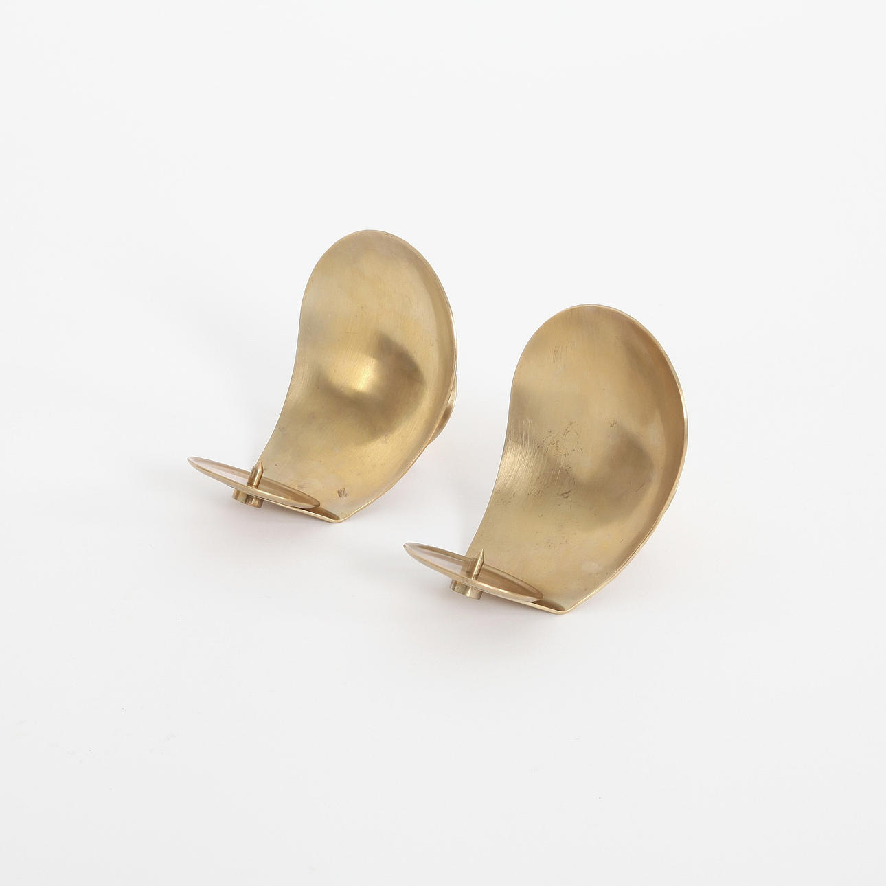 A pair of brass candlesticks, Dantorp Design, Denmark.