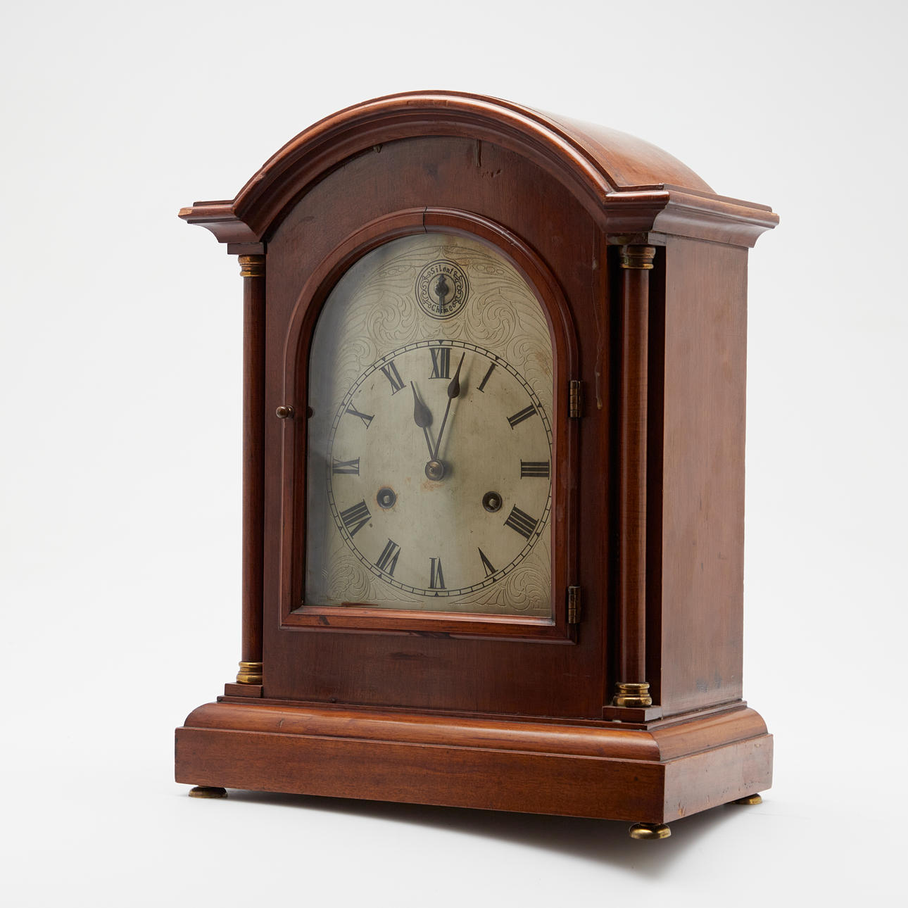 Silent Chime pendulum clock/fireplace clock with manual winding.
