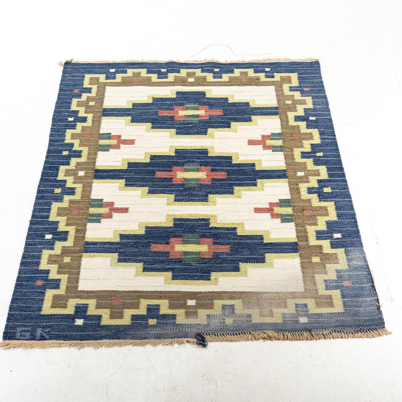 CARPET, wicker, monogram signed GK, approx. 204 x 140 cm.