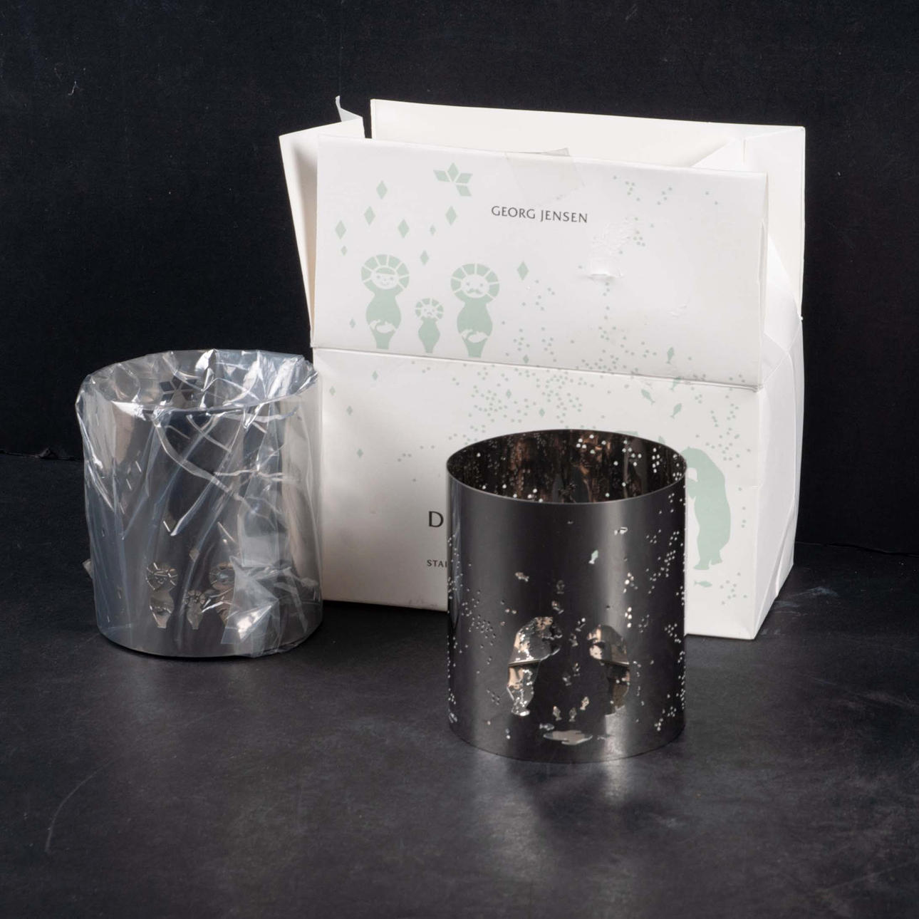 Lyslanterner, et par, Goerg Jensen „Decembertales“.