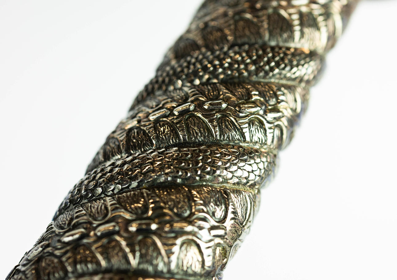 A LARGE CLAYMORE DRAGON SWORD.