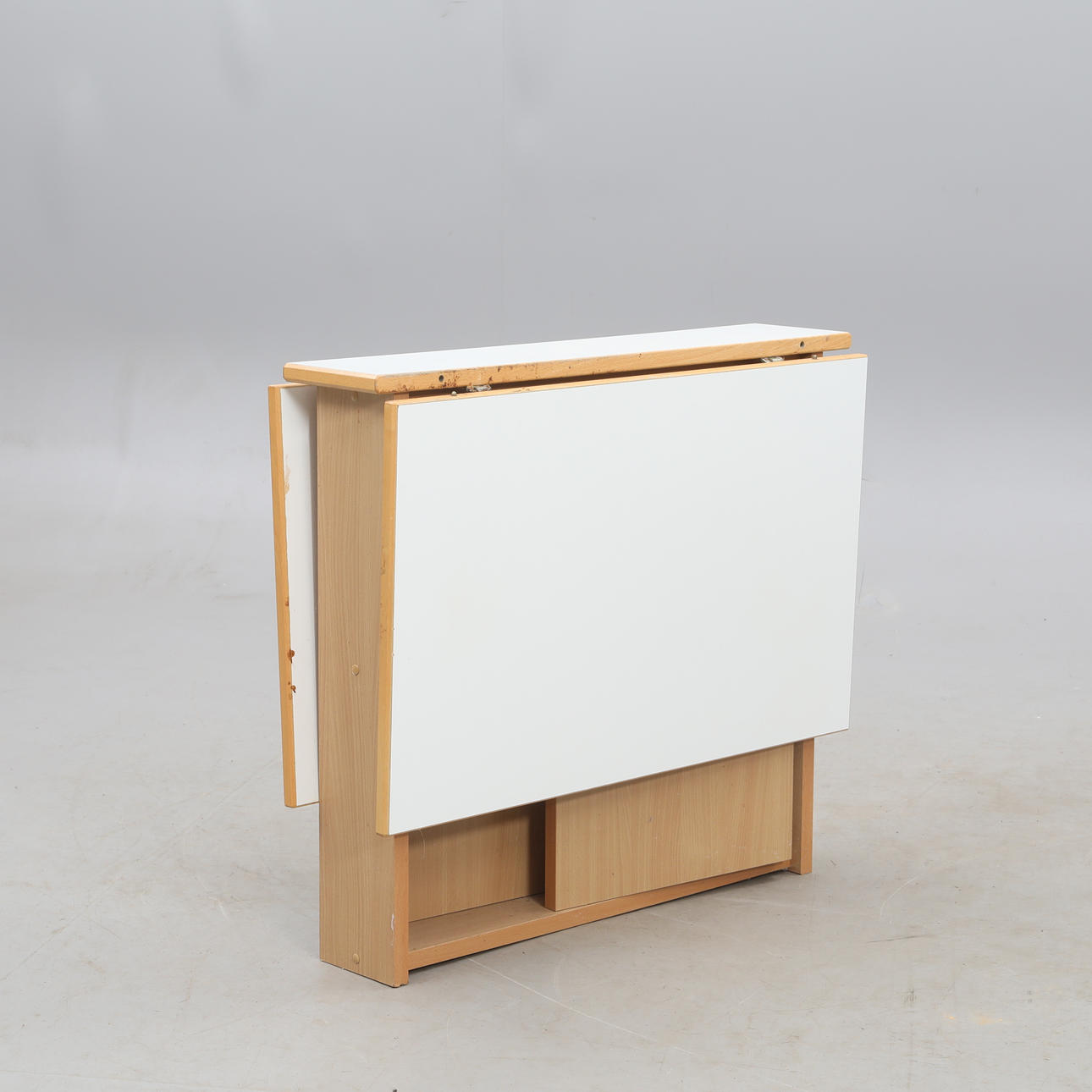 A TABLETOP, with white laminate top, 1980's.