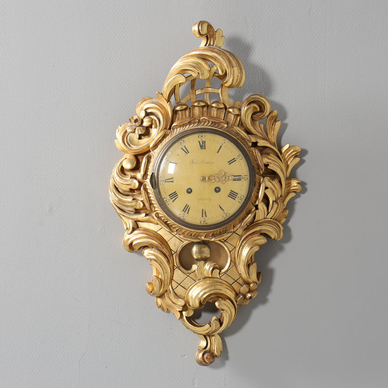A gilt wall clock by Sven Wrange, Gothenburg.