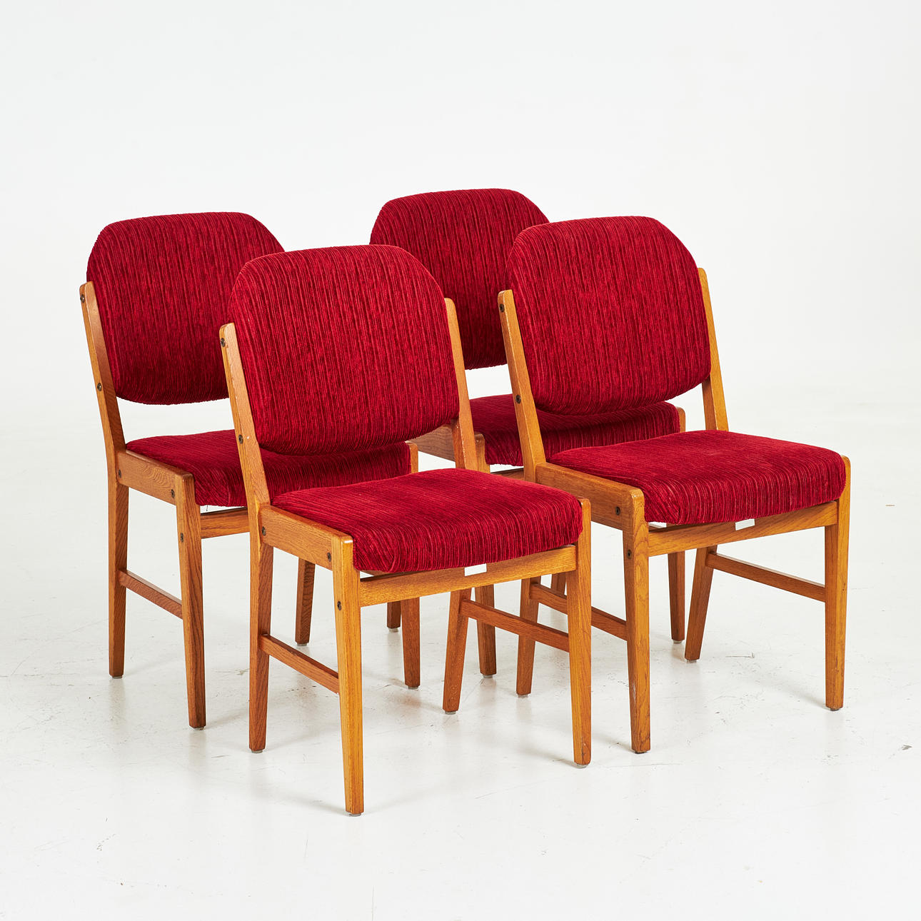 A set of four oak chairs, upholstered seat and back tray, second half of the 20th century.