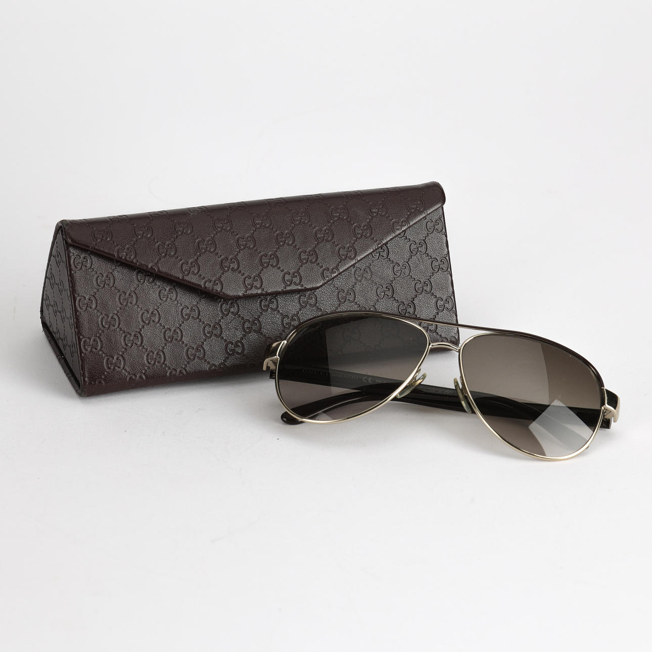 GUCCI, sunglasses and a case, pilot model.