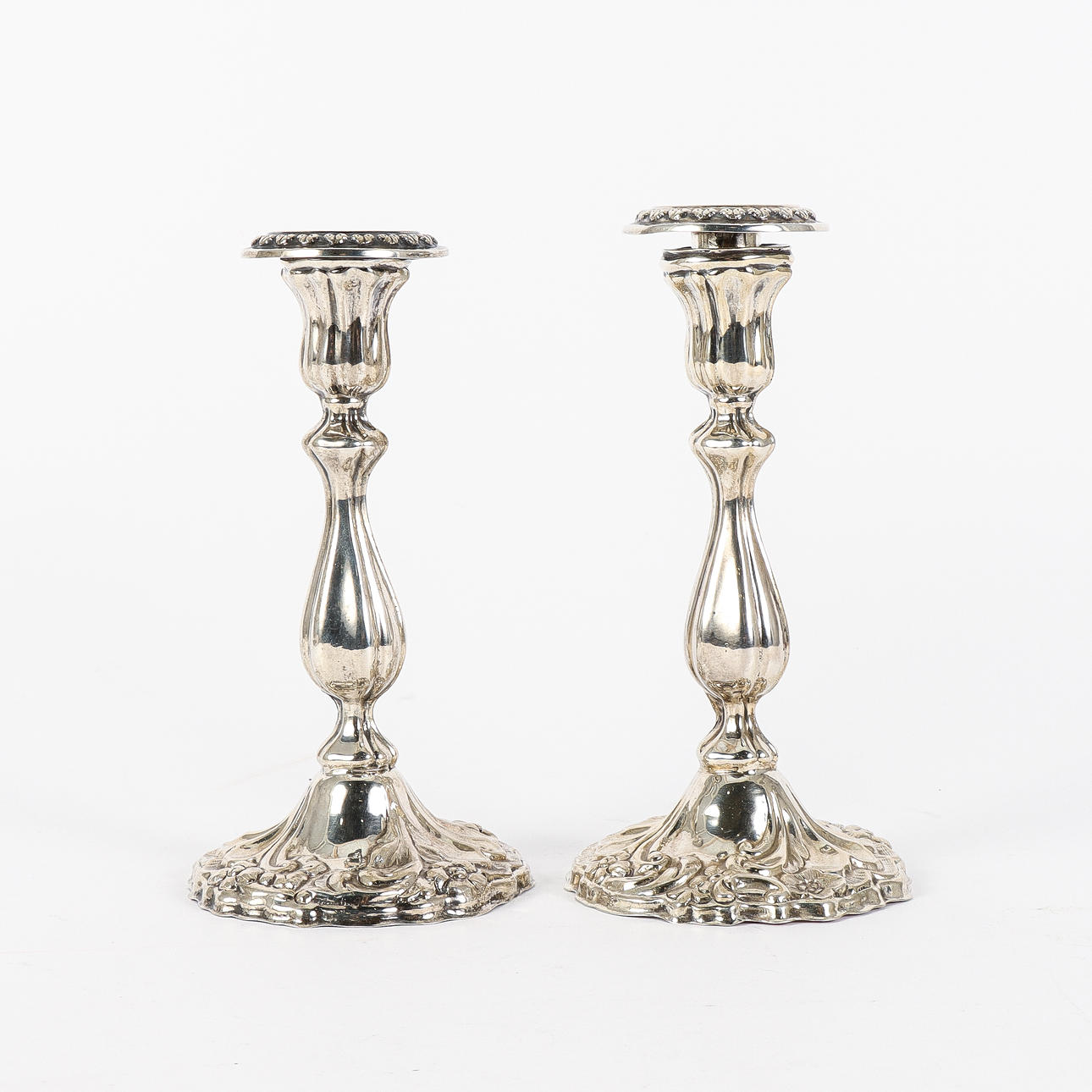 A pair of rococo candlesticks, Christian Brockman, Karlstad 1852.