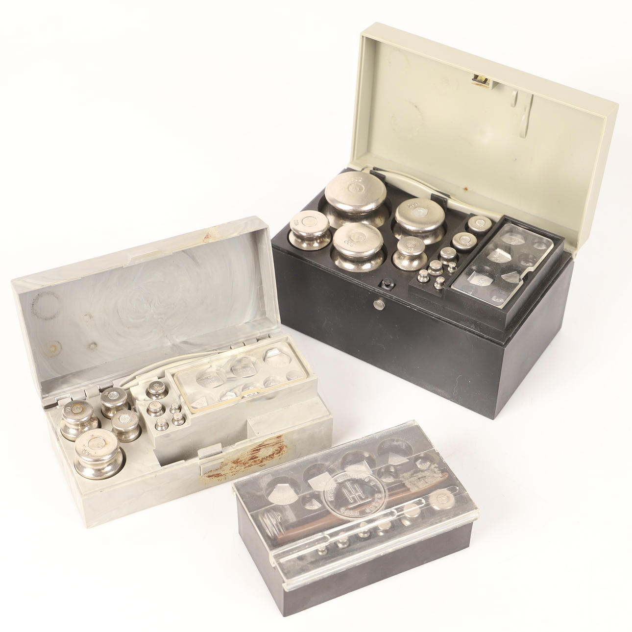 A set of weights, 3 pieces, metal in plastic boxes, Soviet Union, 20th century.